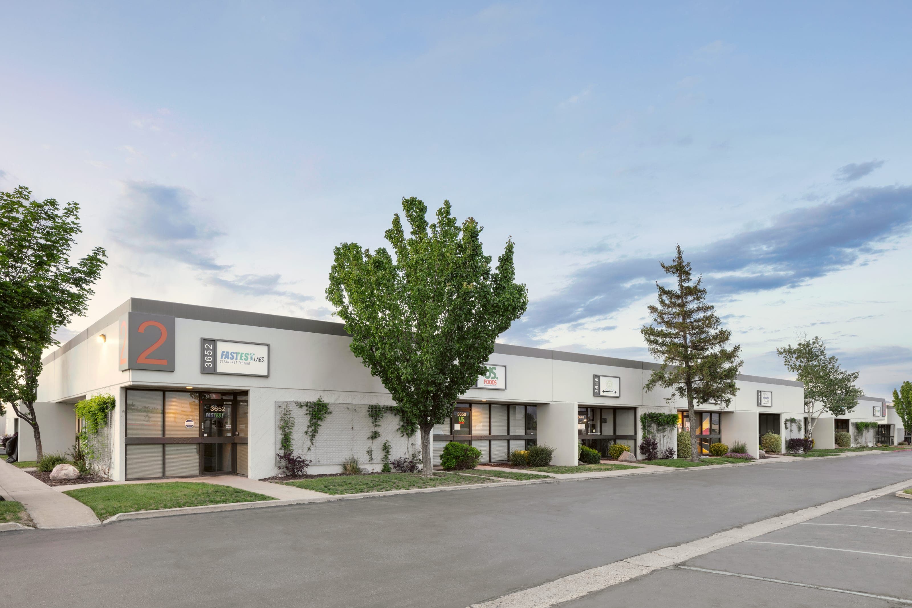Building 2 at Broadbent Business Park in Salt Lake City, office frontage at dusk