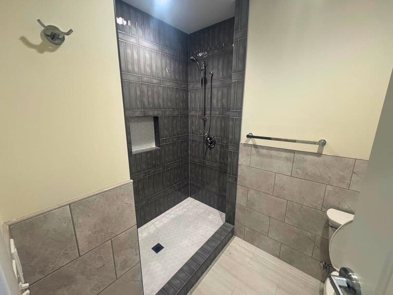 Tiled walk in shower in the renovated suite at 1045 East 3900 South in Millcreek