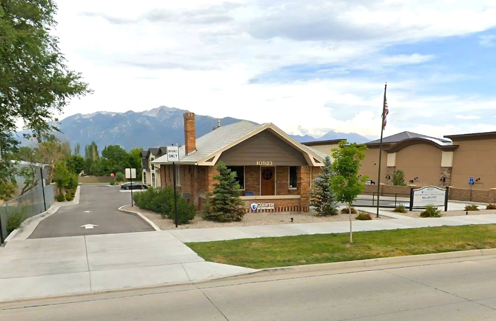 Craftsman style office bungalow with mountain backdrop at 10923 South Redwood Road in South Jordan