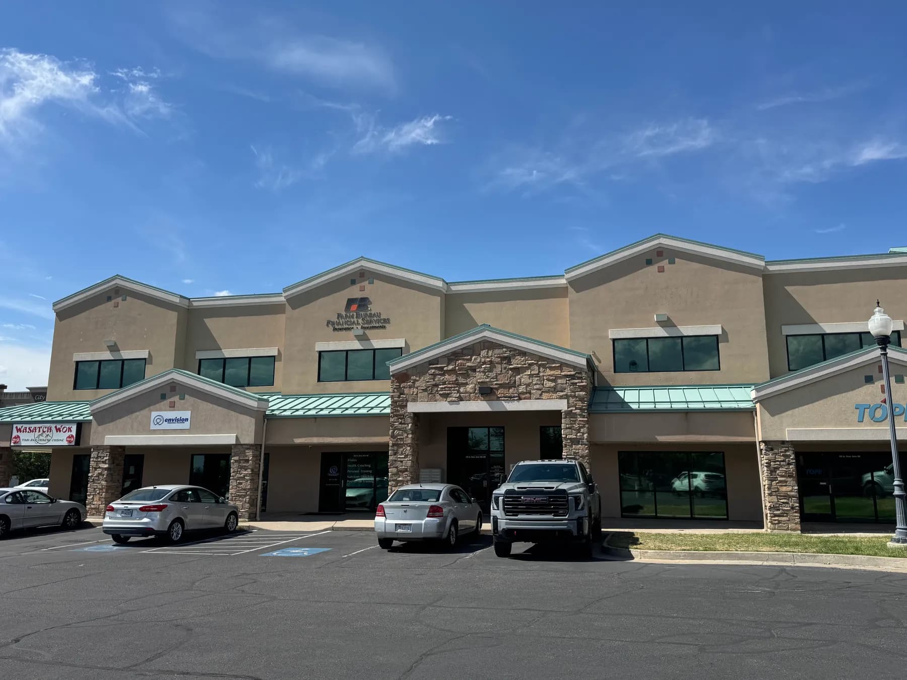 Main entrance and second floor windows of 129 S State St, Clearfield Town Square