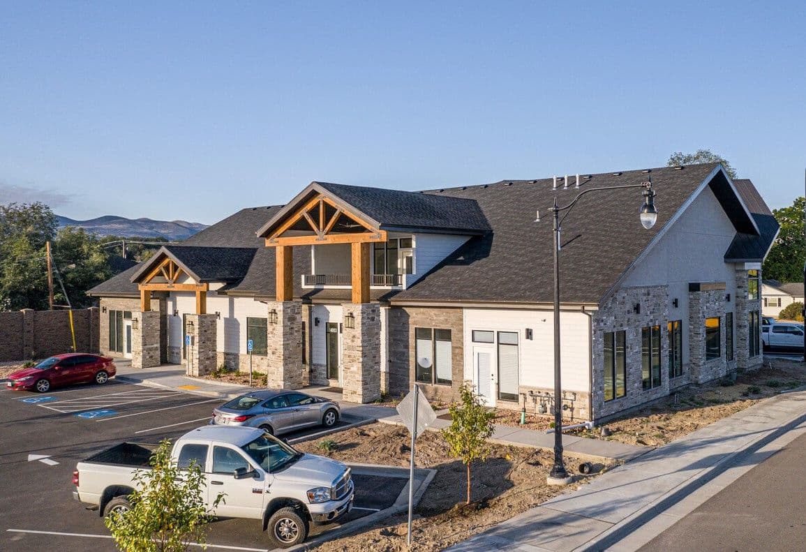 Craftsman style retail building with covered entry at 14003 South Redwood Road in Bluffdale