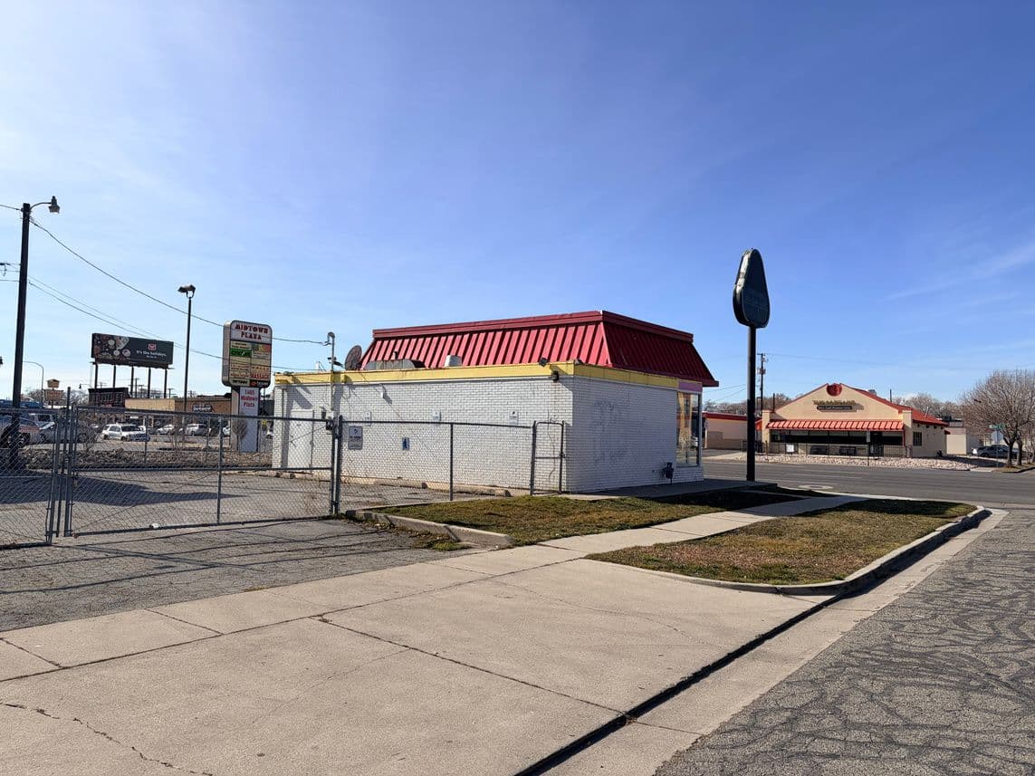 Corner view with pole sign at 1445 South State Street in Salt Lake City