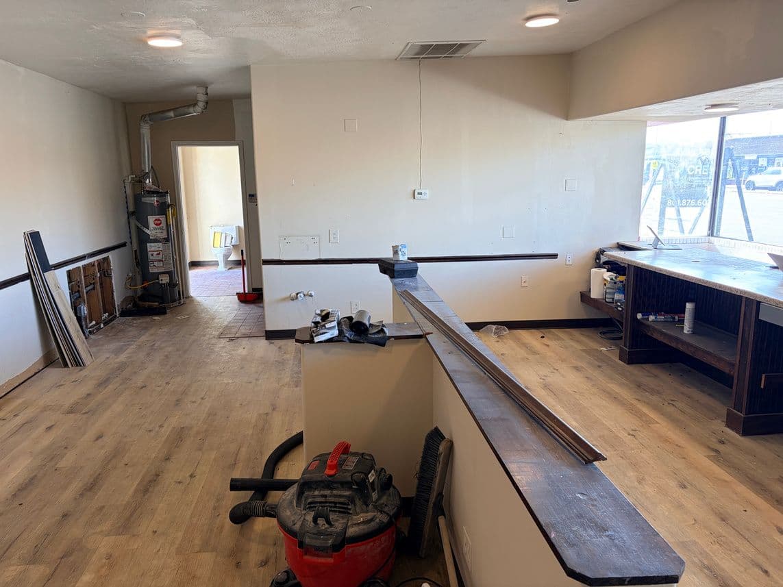 Open interior with wood floor at 1445 South State Street in Salt Lake City