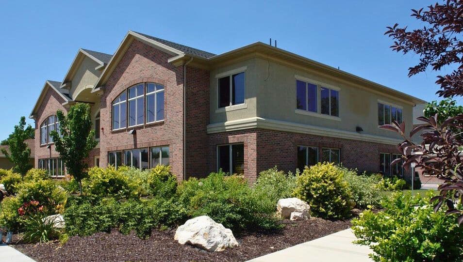 Brick office building with mature landscaping at 189 East Fort Union Boulevard in Midvale