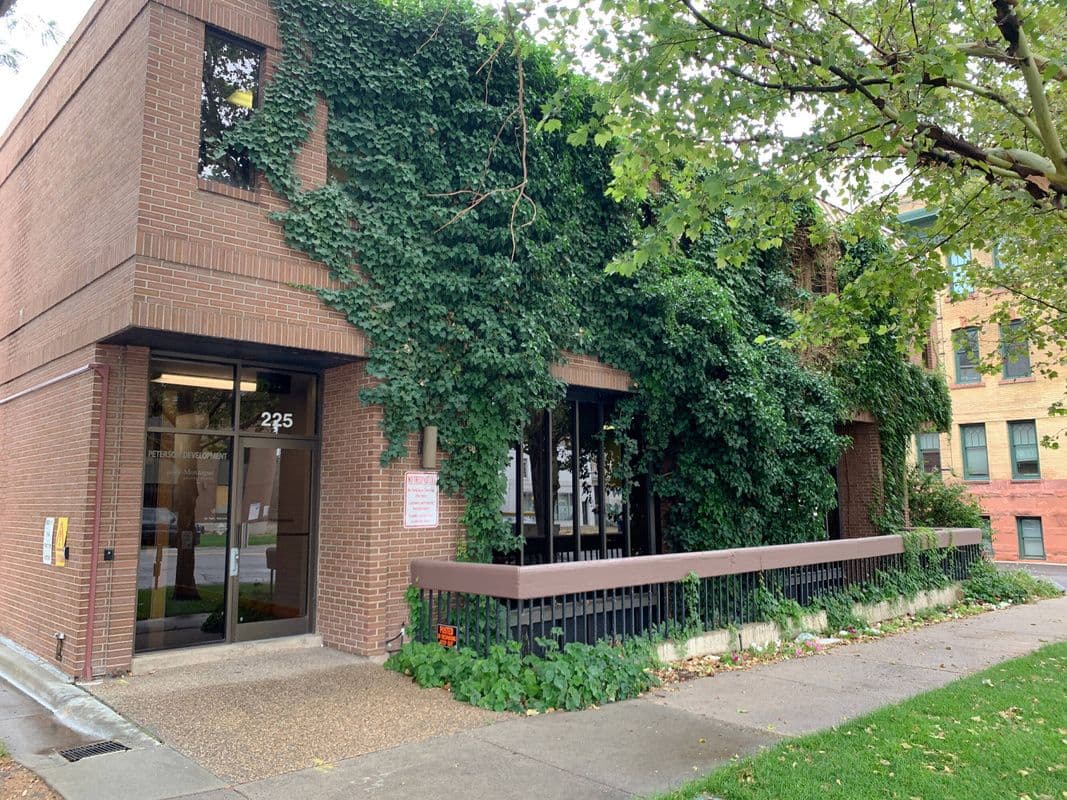 Ivy covered brick entrance at 225 South 200 East in downtown Salt Lake City