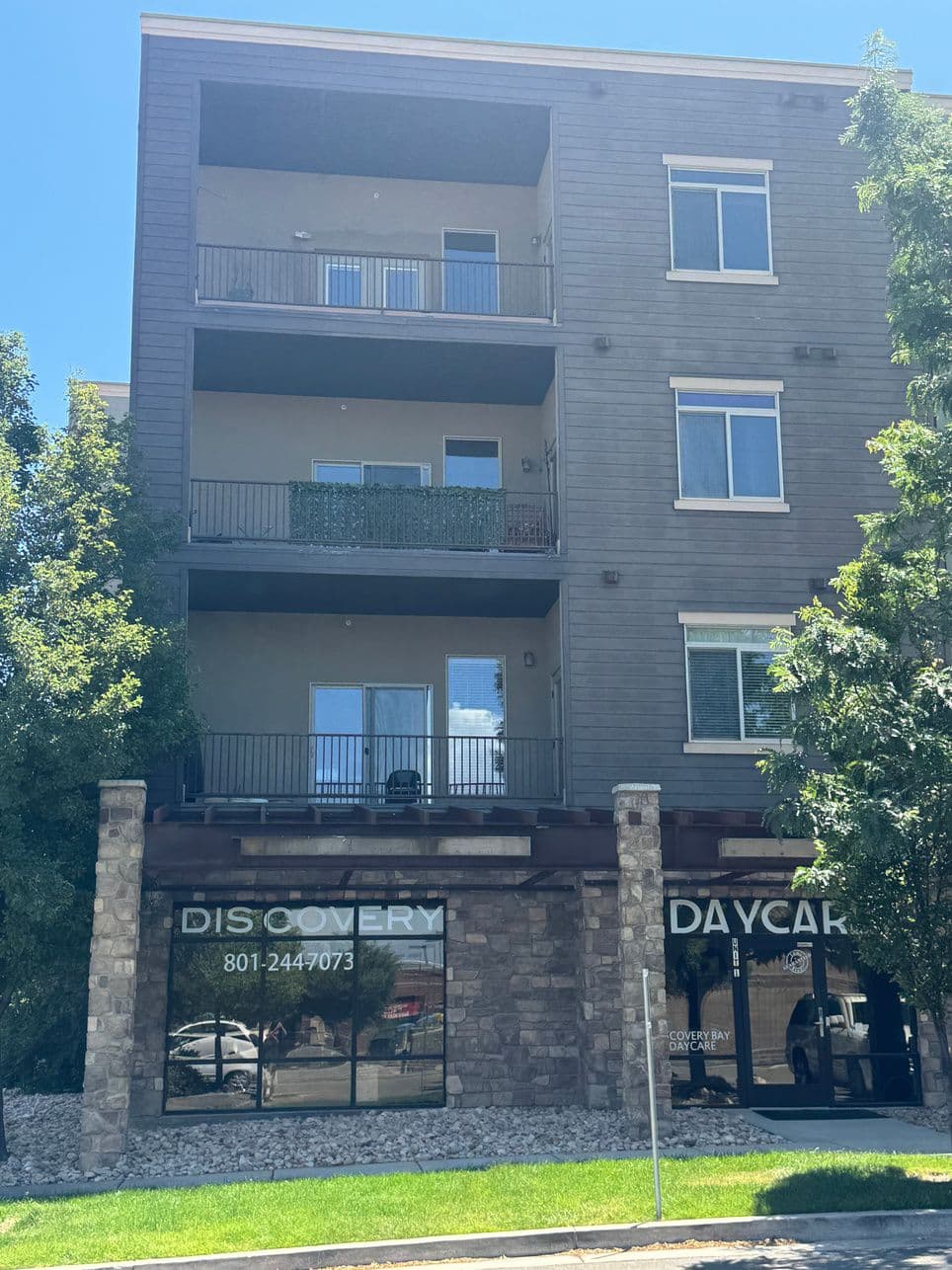 Building facade with ground floor storefronts at 248 East 13800 South in Draper