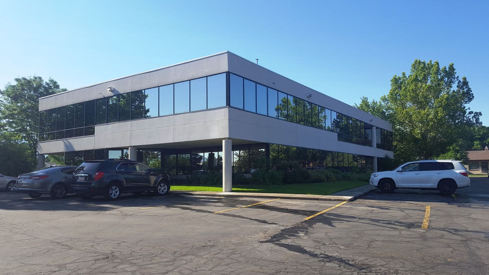 Two story glass office building at 279 East 5900 South in Murray