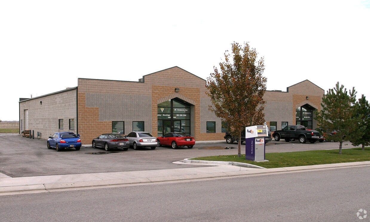 Industrial building with mature trees at 4268-4272 West Nike Drive in West Jordan