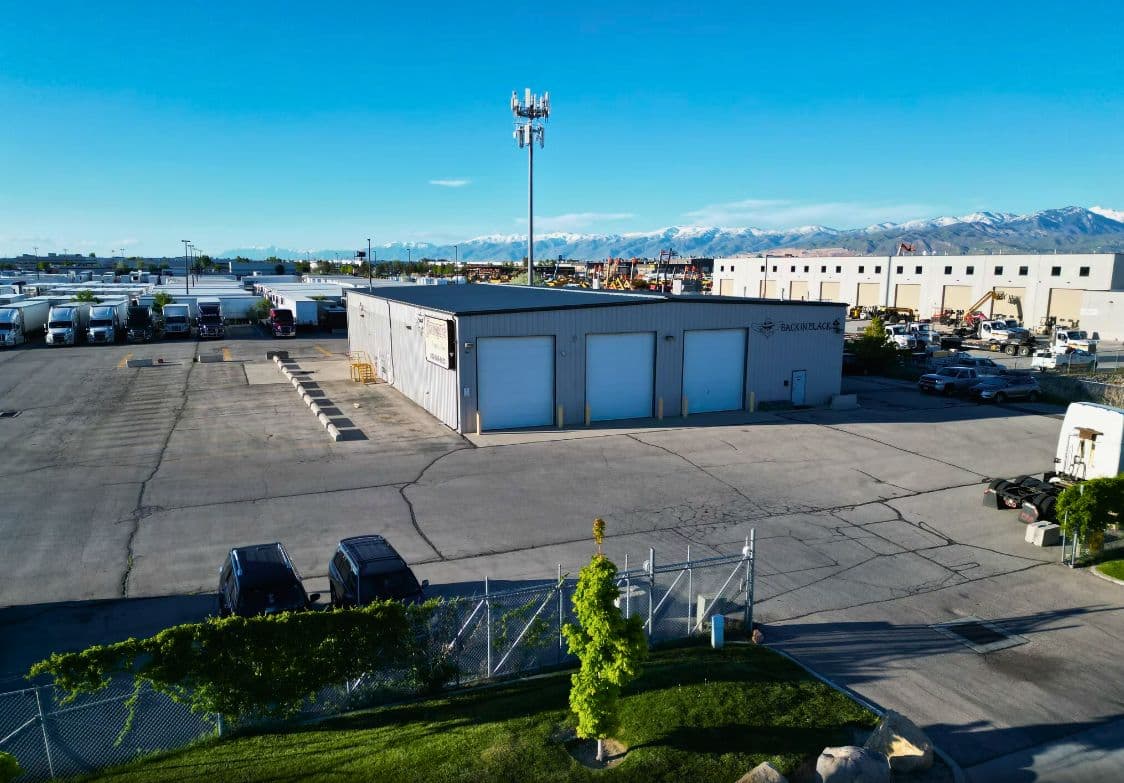 Office building and secured yard at 5114 West 2400 South in West Valley City