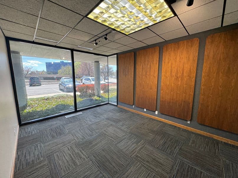 Window office with wood accent wall at 5263 South Commerce Drive in Murray
