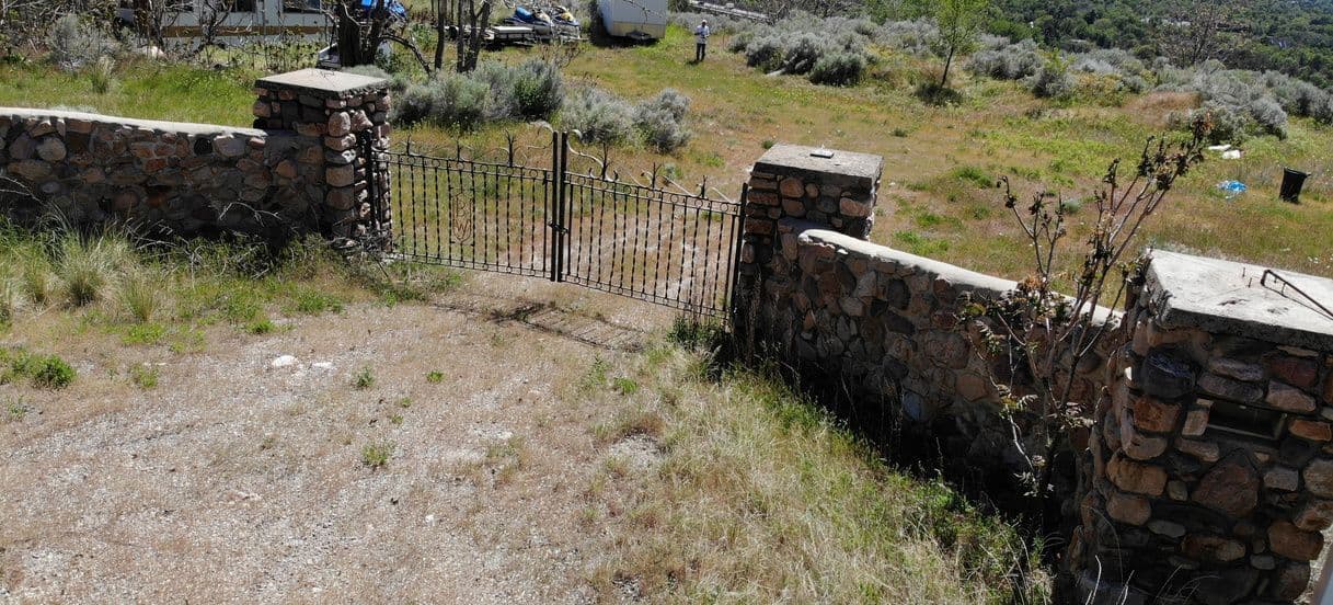 Stone gate entrance at 5830 South Wasatch Boulevard in Holladay