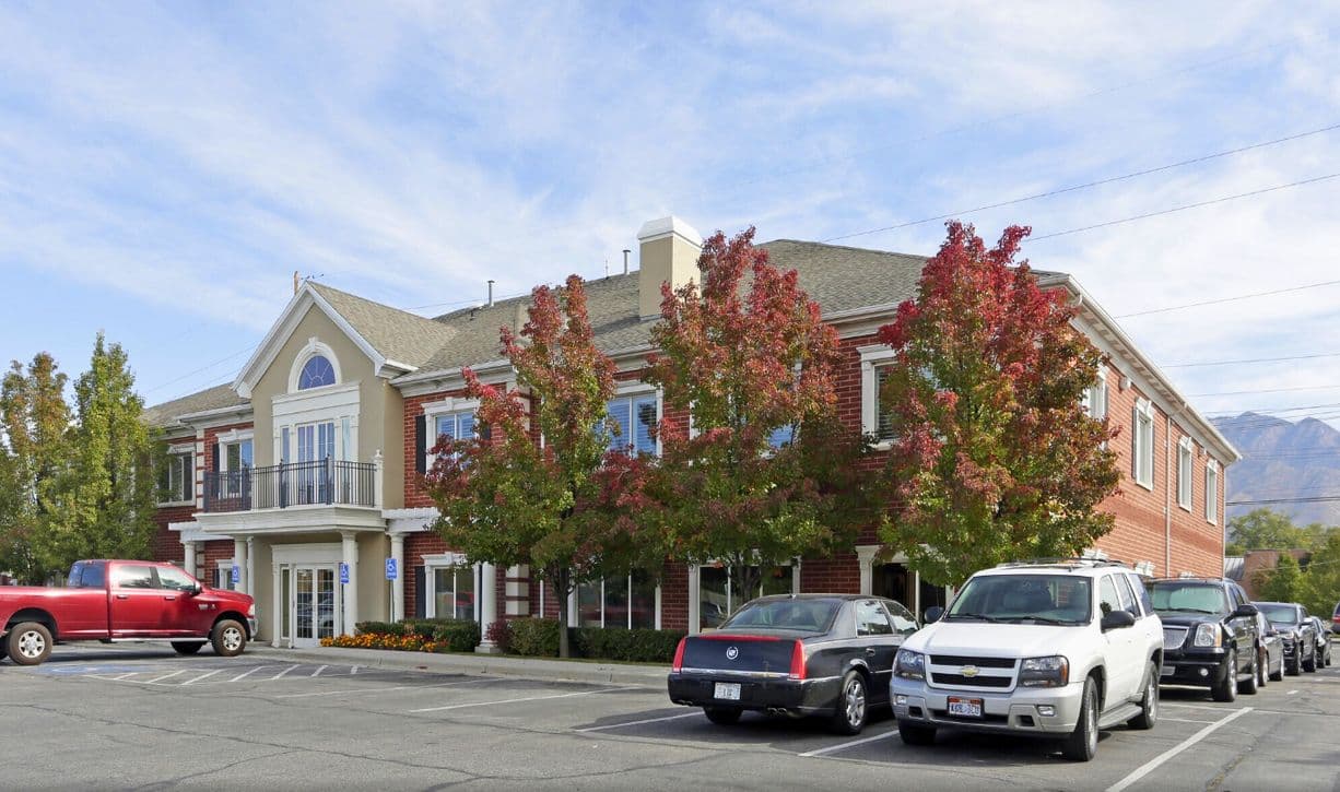 Red brick office building with fall trees at 5872 South 900 East in Salt Lake City
