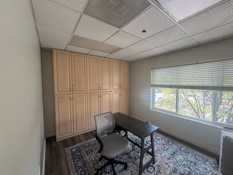 Office with built in cabinets at 5872 South 900 East in Salt Lake City