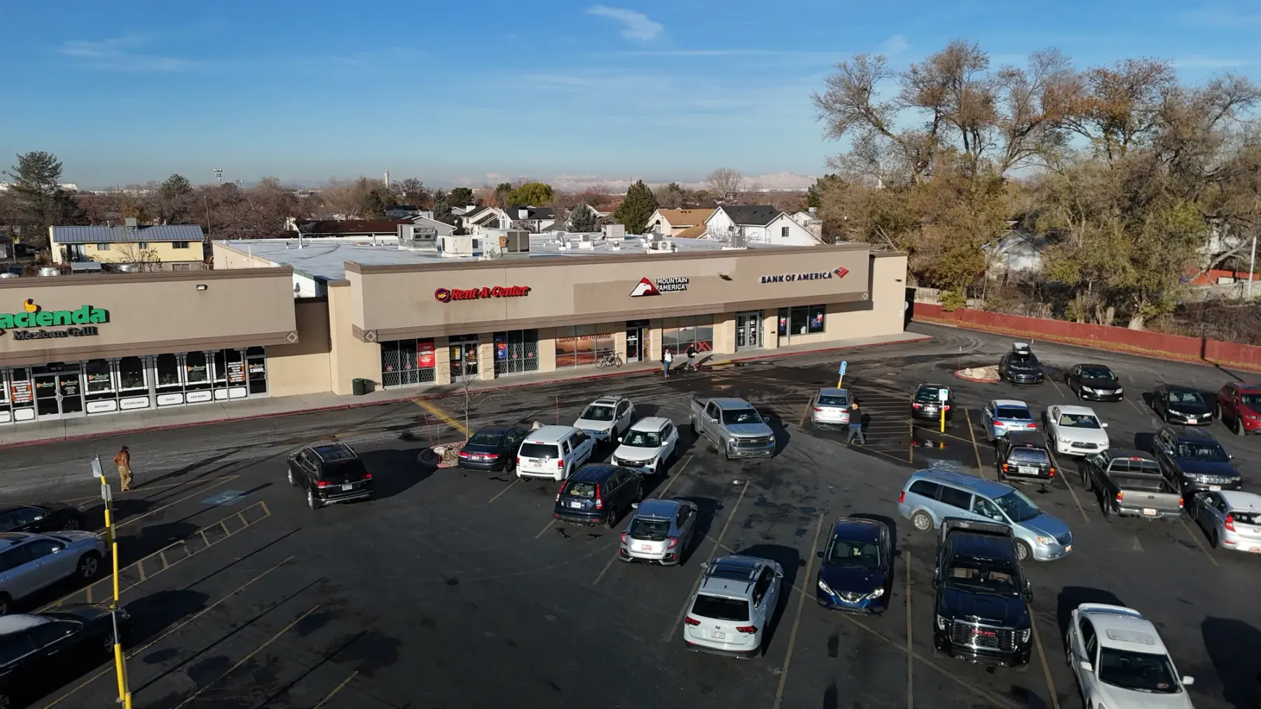 Storefront elevation and parking field at Redwood Plaza, Salt Lake City