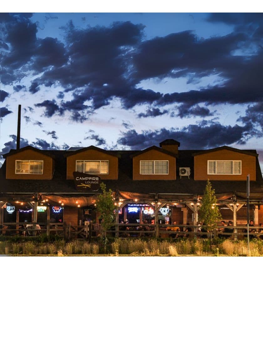Sugar House restaurant building with patio at dusk at 837 East 2100 South in Salt Lake City